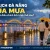 Minh họa du lịch Đà Nẵng mùa mưa với Cầu Rồng, đôi du khách che ô bên sông Hàn và góc cà phê